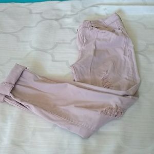 Dusty rose distressed skinny jeans